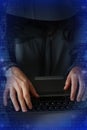 Unrecognizable hacker in front of computer Ã¢â¬â cyber crime concept Royalty Free Stock Photo